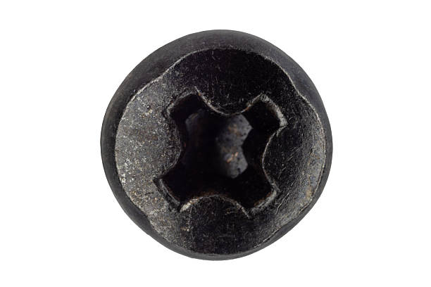 istock Close up of black Phillips screw head 2229618596