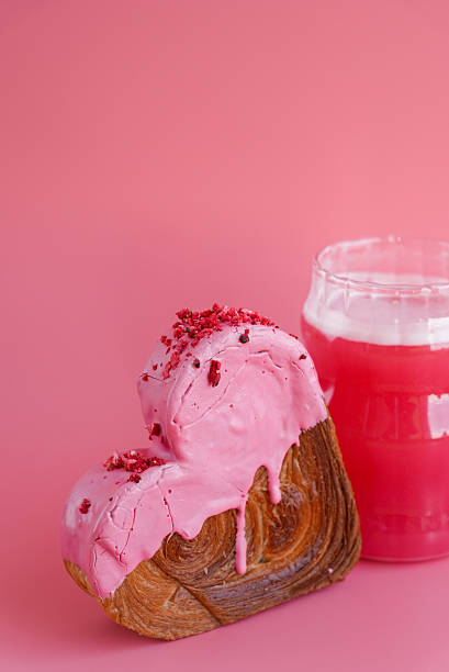 Pink drink Matcha beverage dragon fruit powder superfood greeting card Delicious fresh croissant topped with colorful flavor Ganache. Creation unique heart shape bakery. Puff pastry holiday love gift present idea Valentine's day