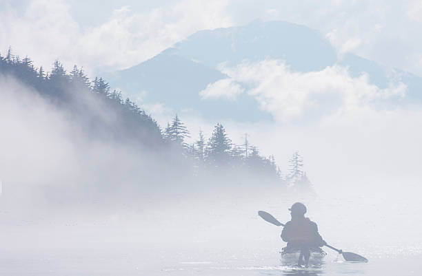 istock Male kayaker in morning mist. 2229622453