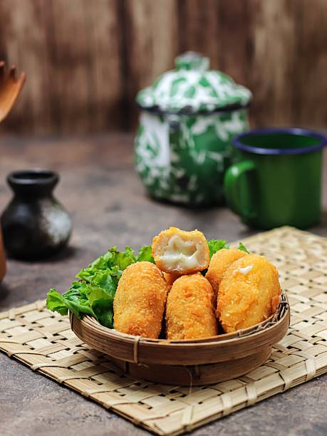 istock Chicken nugget stuffed with melted cheese. 2229626616