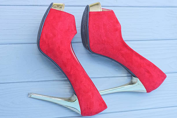Stylish and fashionable pair of woman high heels shoes, perfect for successful modern woman for socialite and sociable sophisticated woman fashion and style concepts, good for multimedia content creation