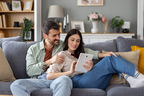 istock Couple Enjoying Quality Time on a Cozy Sofa Together 2229628157