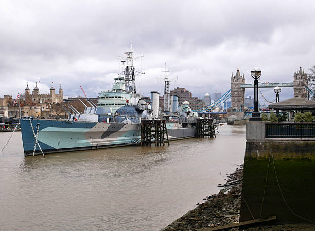 London, England, United Kingdom - February 23, 2023.HMS Belfast, a town class Royal Naval Cruiser permanently moored on the River Thames in London, England.