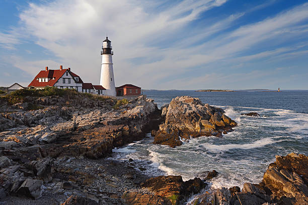istock Portland Head Light in late afternoon surrounded by with dramatic waves and cliffs 2229639372