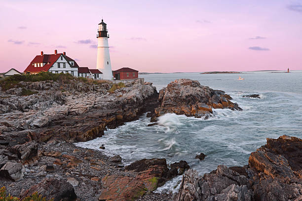istock Portland Head Light at sunset surrounded by with dramatic waves and cliffs 2229639373