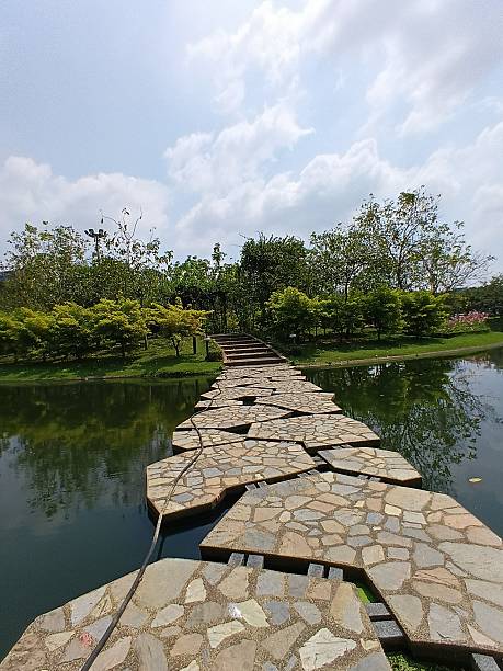 istock Stone bridge across the lake 2229642609