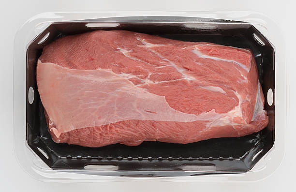 istock Bright red meat in plastic box top view isolated nature background with clipping path 2229649468