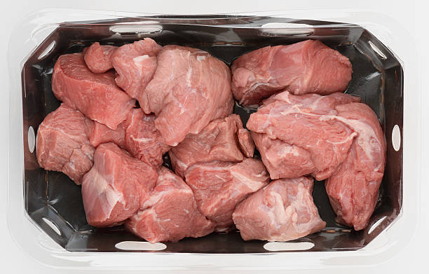istock Fresh pork slices in plastic box top view isolated nature background with clipping path 2229649469