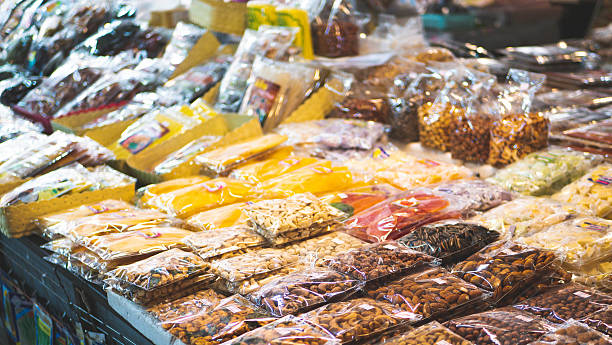 istock market stall dried fruit nuts in bags 2229649517