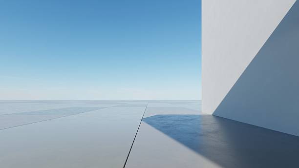 istock 3d illustration of abstract modern architecture background, Minimal geometry architectural design, Car presentation backdrop with empty concrete floor, Geometric white blocks building design 2229653776