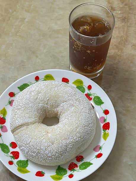 A classic sugar donut with a soft, fluffy texture and coated in a sweet layer of sugar. Perfectly simple yet satisfying, offering a delightful treat with every bite.