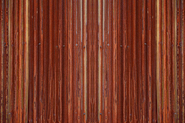 Close-up of rusted corrugated iron wall abstract background.