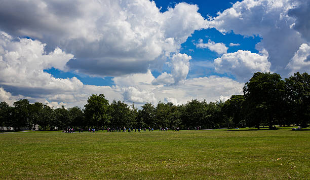 istock Sunny Day at a Public Park in London with Dramatic Clouds 2229658967