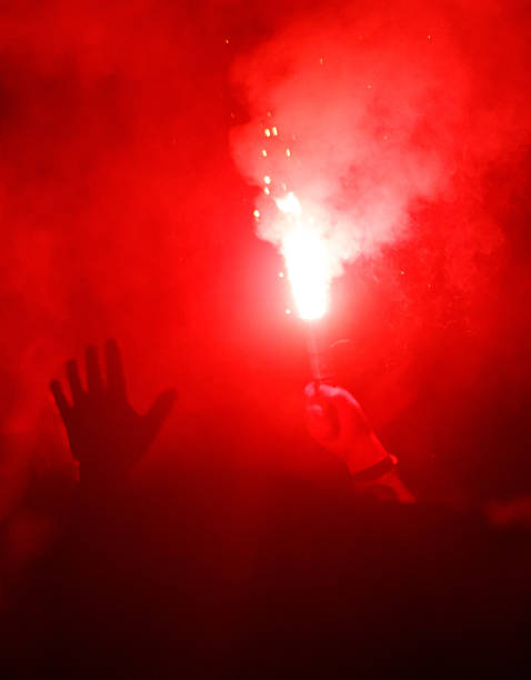 istock A person holding a red lit torch 2229663931