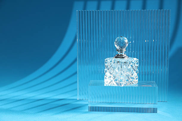 istock Stylish presentation of perfume bottle on light blue background, space for text 2229664815