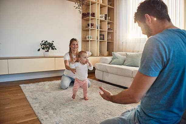 istock First steps of our baby 2229665733
