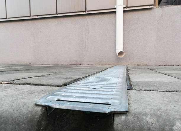 istock Close-up of galvanized metal grating for sidewalk drainage 2229668021