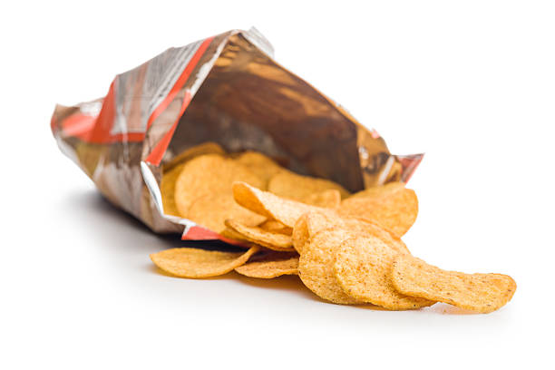 istock Crispy potato chips in a bag isolated on white background. 2229670557