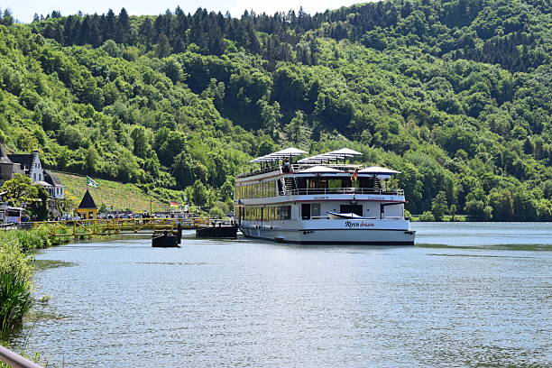 Beilstein, Germany - May 09/2025: cruise ship docked at the medieval village Beilstein