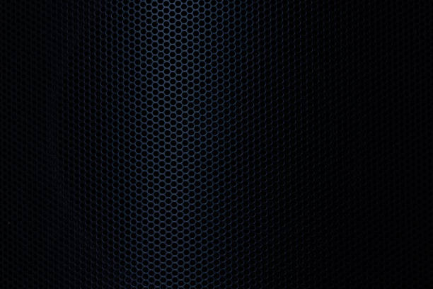 istock Black technology background texture macro,Speaker grille texture,Close-up of black background texture,macro black background texture,Seamless pattern of texture silver or stainless steel hexagon for background. Abstract. 2229672715