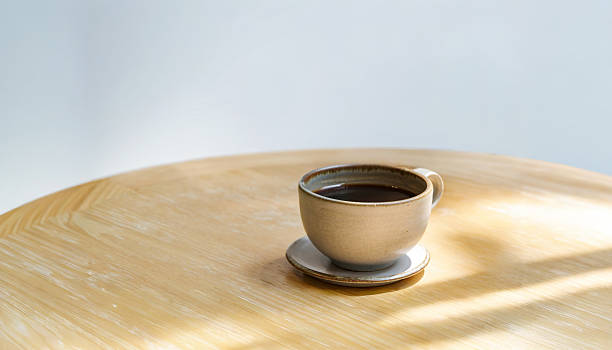 istock hot black coffee on the wooden table at cafe 2229677885