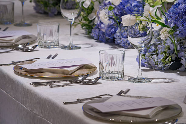 istock wedding reception dinner table suit set up with decoration flower before evening event start 2229678127