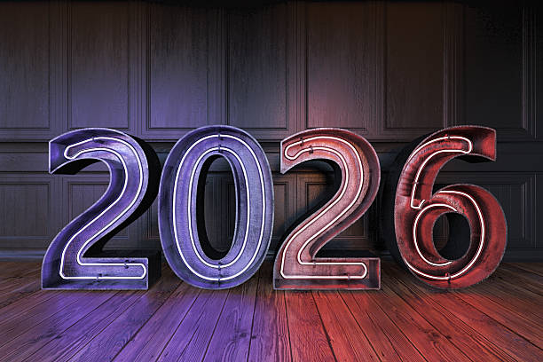 istock 2026 Neon Sign Against Black Wall 2229682377