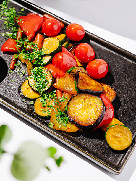 istock Grilled vegetables with fresh herbs served on a sleek platter 2229682578