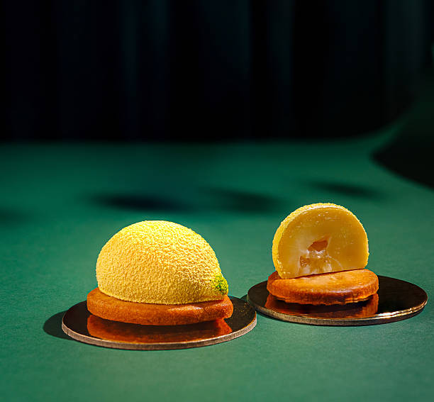 istock Creative dessert showcasing a lemon-inspired design on a green table 2229682826