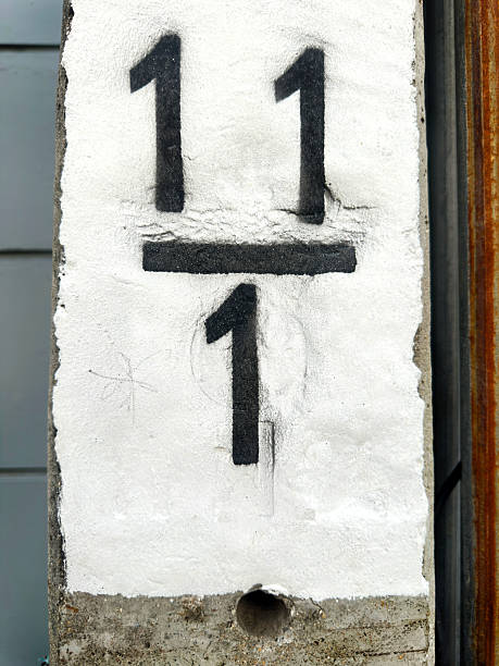 Close up number 111  painted on concrete block