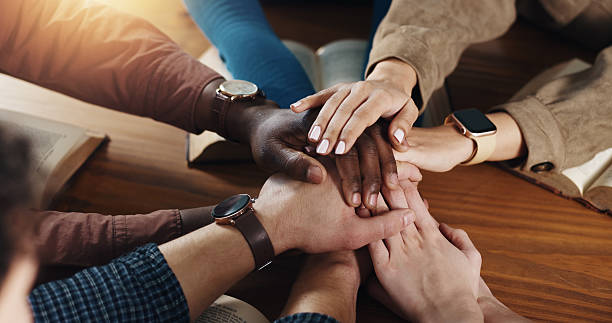 istock Stack of hands, solidarity and business people in office for unity, collaboration and support. Team building, top view and group of corporate employees with partnership, goal or trust in workplace. 2229683374