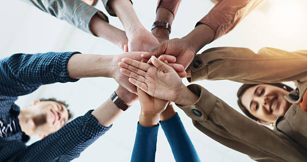 istock Below, business and people with hand stack for team building, solidarity and trust with motivation. Staff, scrum and huddle in circle with collaboration, employees unity and synergy for connection 2229683462