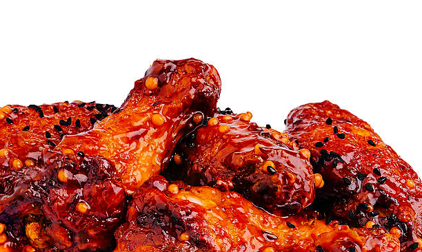 istock Delicious spicy chicken wings served on a white background 2229683506