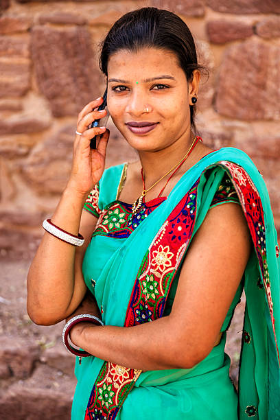 istock Young Indian woman using mobile phone, Jodhpur, India 2229683918