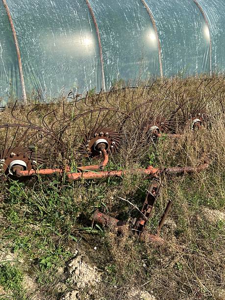 istock old hay shoveling machine 2229684226