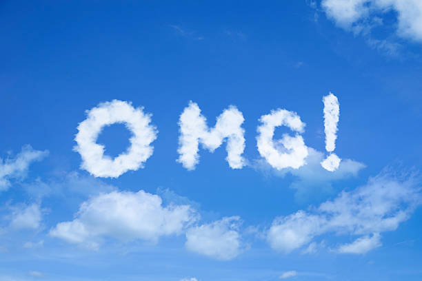 istock OMG cloud text with exclamation mark on bright blue cloudy sky background 2229684287