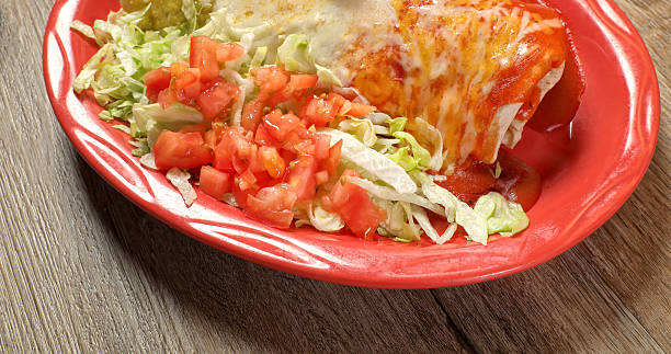 istock Mexican food burrito dish  on wooden table 2229687392