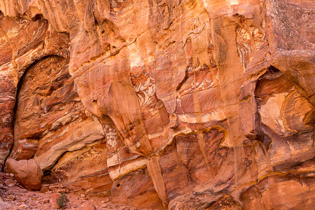 istock Sandstone rock and mineral layers in Petra, Jordan 2229689497