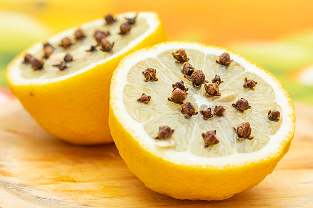 istock Clovess on lemon, traditional method to scare the flies. 2229691068