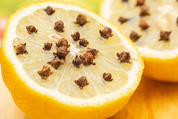 istock Clovess on lemon, traditional method to scare the flies. 2229691073