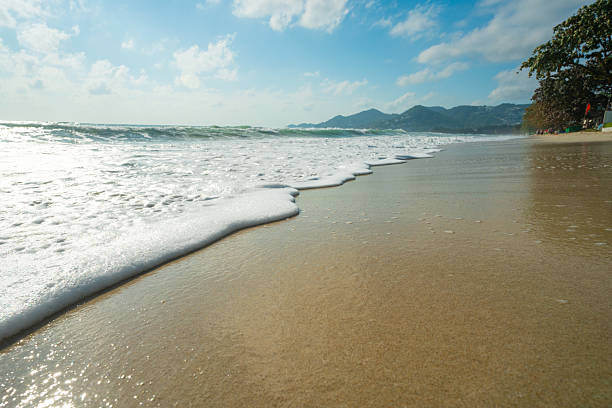 Sea beach wave turquoise water sunny day blue sky with cloud summer vacation Samui island Thailand