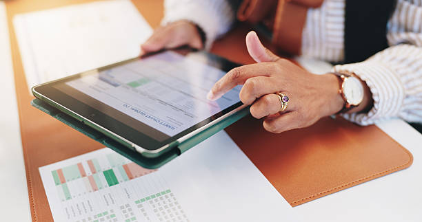 istock Hands, tablet and screen with gantt chart, office and human resources management at corporate agency. Person, tech and click ux for statistics review, application and spreadsheet for admin at company 2229696653