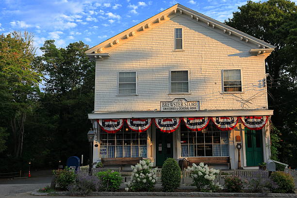 Woodstock, Vermont - September 30th, 2019: Small business surrounded by lush foliage on a cool Fall day in the historic New England town of Woodstock.
