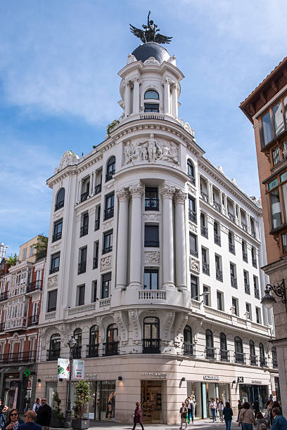 Valladolid, Valladolid, Spain - May 17, 2025: Union and Phoenix Building, by architect Gutierrez Prieto, has an Intimisimi chain store on the ground floor.
