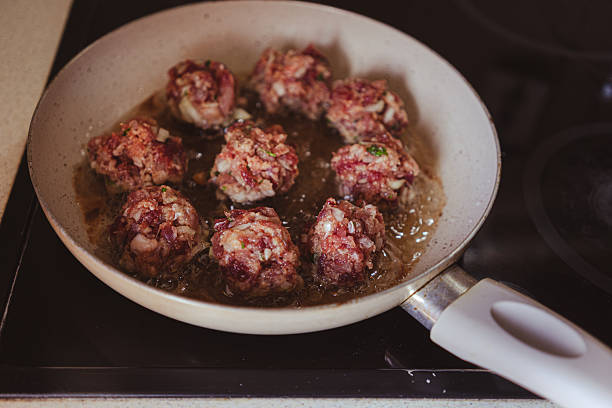 Homemade minced meat steaks, details of the kitchen counter while the food is being prepared.