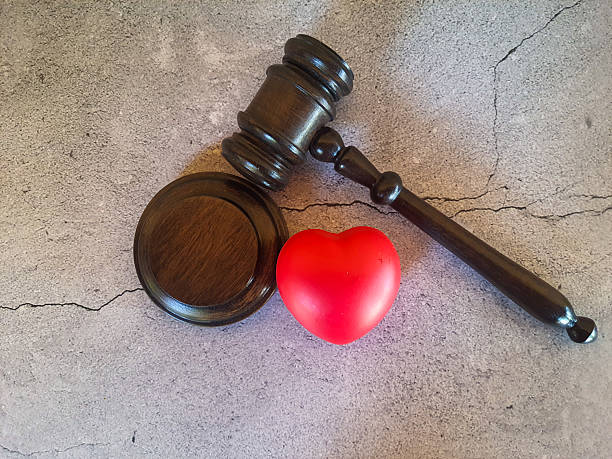 istock Judge's gavel with red heart 2229712855