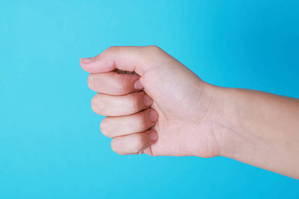 istock Woman with visible hand veins on light blue background, closeup 2229713909