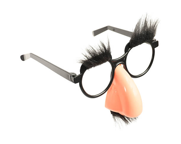istock Funny eyeglasses with fake nose, mustache and eyebrows on white background 2229714244