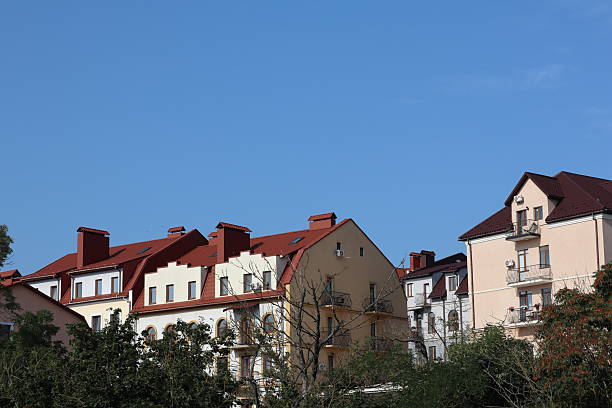 istock Charming residential buildings under a clear blue sky in a small town 2229717869