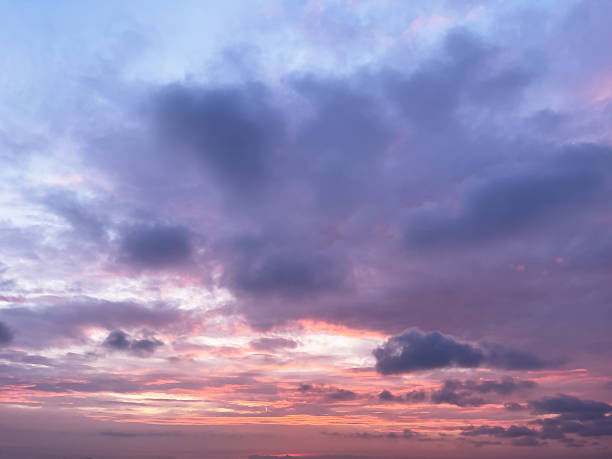 istock Twilight pink and purple sunset sky with soft and smooth clouds background. 2229723114